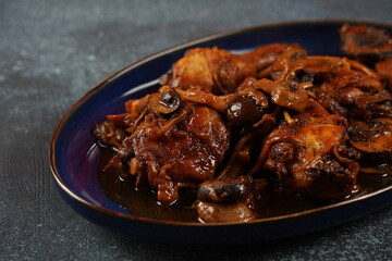 Deep fried chicken with mushrooms ,onions and  date syrup.