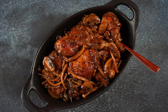 Deep fried chicken with mushrooms ,onions and  date syrup.