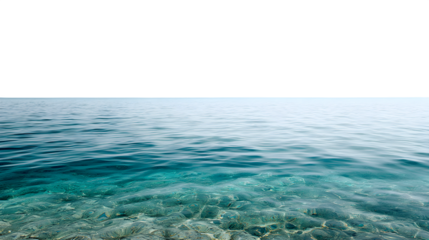 Calm, crystal-clear ocean with a soft horizon