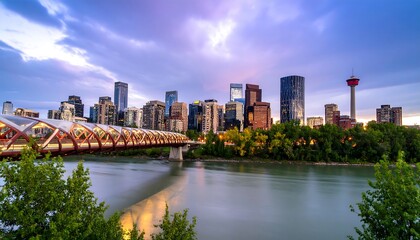 Naklejka premium City skyline at sunset over river (5)