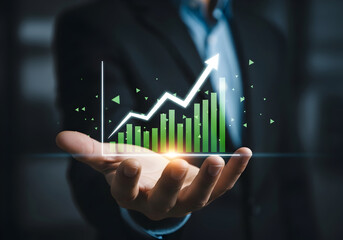 Businessman Holding Digital Graph with Growing Trend in Hand, Representing Financial Growth and Data Analytics