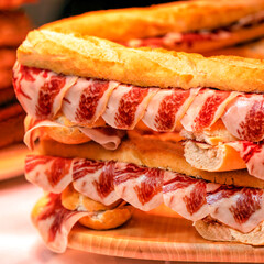Spanish sandwich with jamon. Gastronomy and tourism	