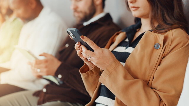 Hands, business and woman with phone in waiting room for job interview, sign up and company website. Person, candidates and mobile for research, online application and reading feedback of recruitment