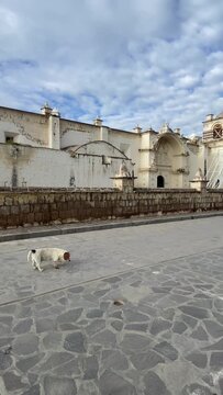 Church of the Immaculate Conception with mountains behind in Yanque, Colca Canyon, Peru.