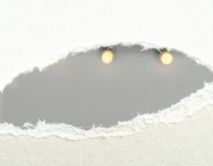 Close Up of Torn Paper Edge with Visible Fiber Strands and Gentle Soft Lighting