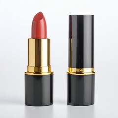 Obraz premium Elegant red lipstick in black and gold casing alongside its cap isolated on white background