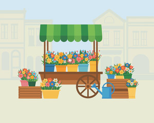 Charming flower cart displaying colorful blooms in a town setting