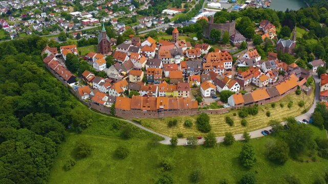 Aerial panorama view around the city and Dilsberg Castle in Germany beside the neckar river. On a sunny spring day.