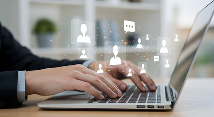 Person typing on a laptop with a network of user and chat bubble icons. Represents social networking, online communication, and community.