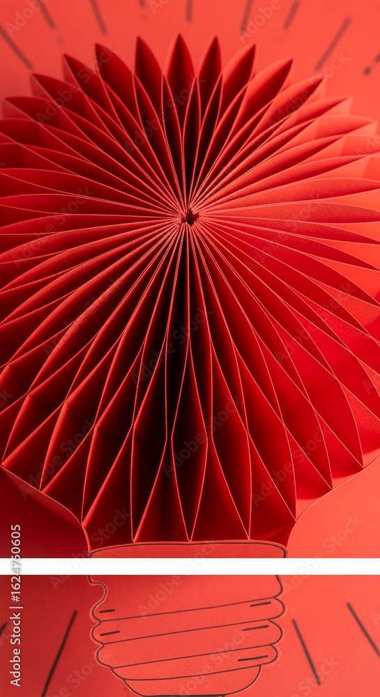 Aufkleber close-up of red paper folded into bulb shape, creating radial texture showcasing innovative design c