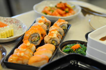 maki or salmon maki or sushi or salmon rolls, Japanese food or salmon sushi roll or salmon maki sushi and California maki or Japanese roll