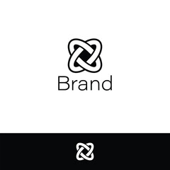Interlocking Letter X crossed orbit monogram.