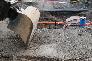 Large construction site with a large shovel digging into the ground