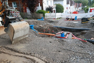 Construction site with a large excavator digging a hole