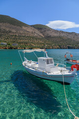 Small Boat on Turquoise Waters at Paralia Kotrona, Mani, Greece