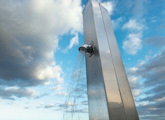 Outdoor public shower directly on the beach in Playa Del Ingles, Gran Canaria, with a refreshing...