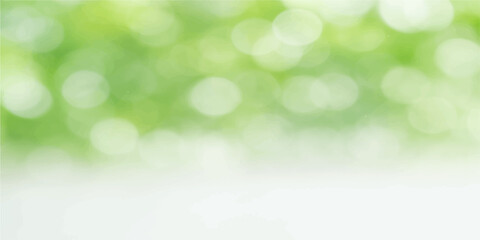Obraz premium Green abstract bokeh background with soft light and natural spring colors