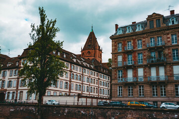 Old architectural building in the city of Strasburg and river. Cityscape