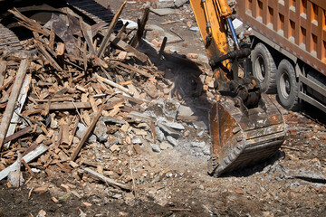excavator bucket on dismantling site, side view.