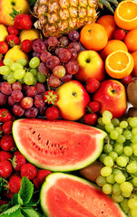 Variety of fruits and berries. Fresh raw  fruits.