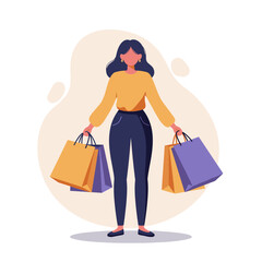 Woman smiling while holding shopping bags in casual outfit  