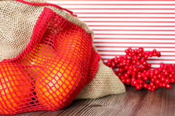 Festive close-up of oranges and red berries