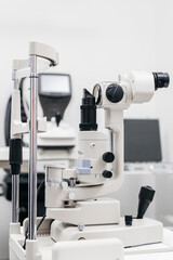 Ophthalmology equipment featuring a slit lamp in a modern clinic, showcasing advanced technology for vision testing and eye examinations