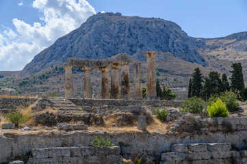 Ancient Corinth with the Temple of Apollo Ruins and Acrocorinth Fortress in the Background,...