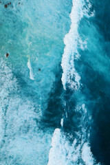 Vertical Horizon Seascape dark ocean background wave splash rock. Tropical sea beach in summer...