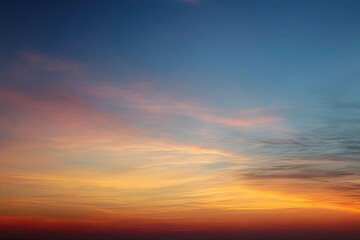 Fototapeta premium Vibrant sunset sky with clouds