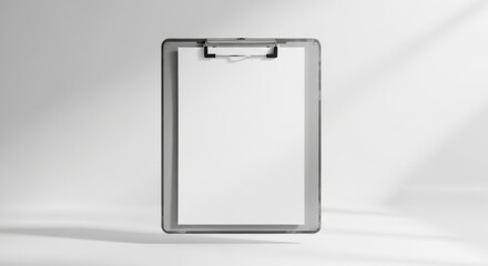 Empty Clipboard on White Background in Bright Lighting for Office and Business Use