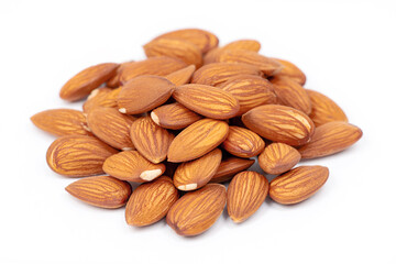 Organic almond nuts on white background.