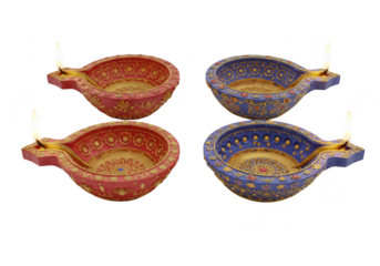 Photo of four ornate diyas with intricate designs are lit, symbolizing the celebration of diwali isolated on transparent background