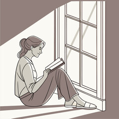 A woman seated near window holding an open book