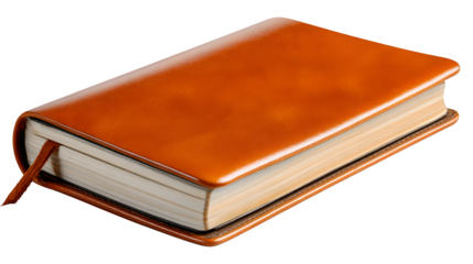 A close up studio shot of a closed orange notebook with a bookmark against a black background
