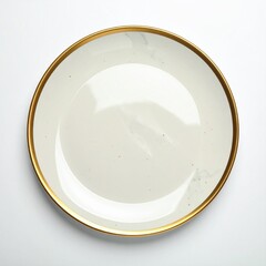 Empty round plate with gold trim, light beige surface, speckled design