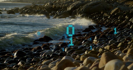 Floating turquoise binary digits hovering above smooth beach stones on rocky shore, with waves