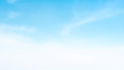 Blurred light blue sky with faint white cloud wisps near the horizon