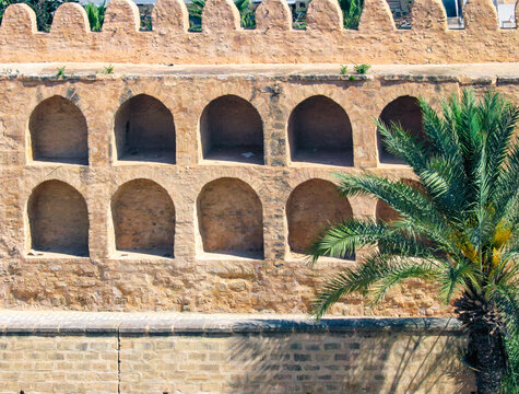 Small niches line the outer wall of Sousse&rsquo;s Ribat &mdash; practical storage turned visual rhythm. Fortification shaped by repetition and scale.