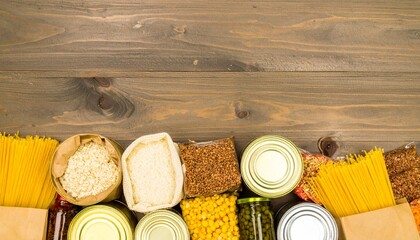 Rustic pantry shelf with assorted non-perishable foods—grains, pasta, canned goods, and preserved vegetables—arranged neatly against a warm wooden backdrop.
