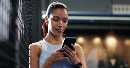 Girl, phone and chat with texting at tennis court for padel game, exercise and thinking for post on web. Woman, athlete and smartphone at night, scroll or mobile app for social network at sports club - Powered by Adobe