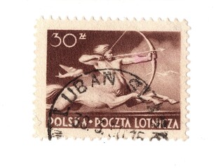 A vintage postage stamp from Poland isolated on a white background.