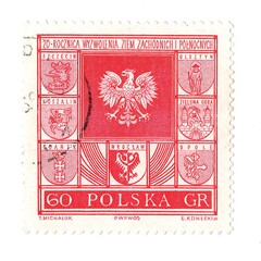 A vintage postage stamp from Poland isolated on a white background.