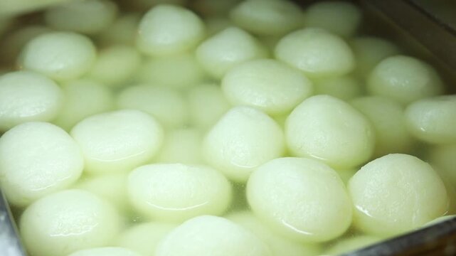 Rasgulla an indian dessert white balls dipped in sugar syrup