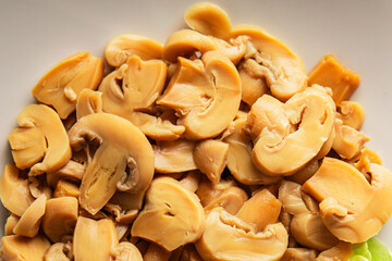 champignon slices canned mushrooms salad fresh delicious gourmet food background on the table ...