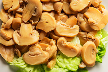 champignon slices canned mushrooms salad fresh delicious gourmet food background on the table ...