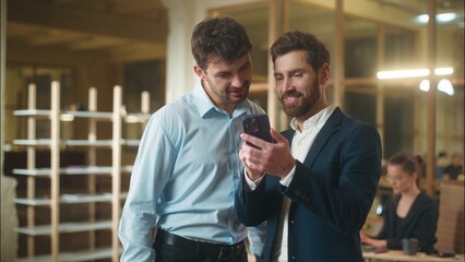 Happy businessmen colleagues friends male business partners guys fellows Caucasian men funny...
