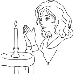Young woman praying with folded hands by candle for World Mental Health Day  