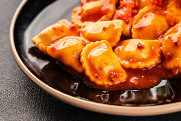 Ravioli beef tomato sauce second course fresh delicious gourmet food background on the table rustic food top view copy space
