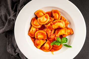 Ravioli beef tomato sauce second course fresh delicious gourmet food background on the table rustic food top view copy space